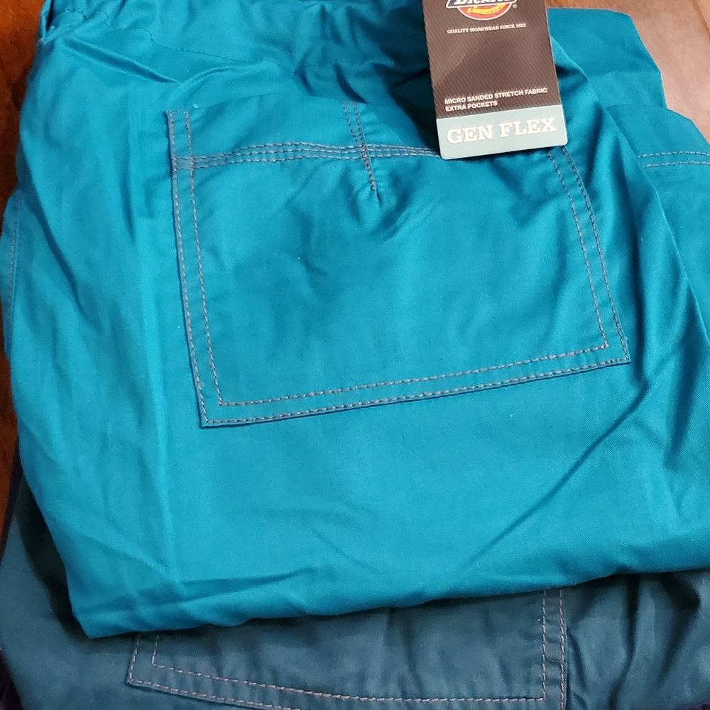 TWO SCRUB CARGO PANTS